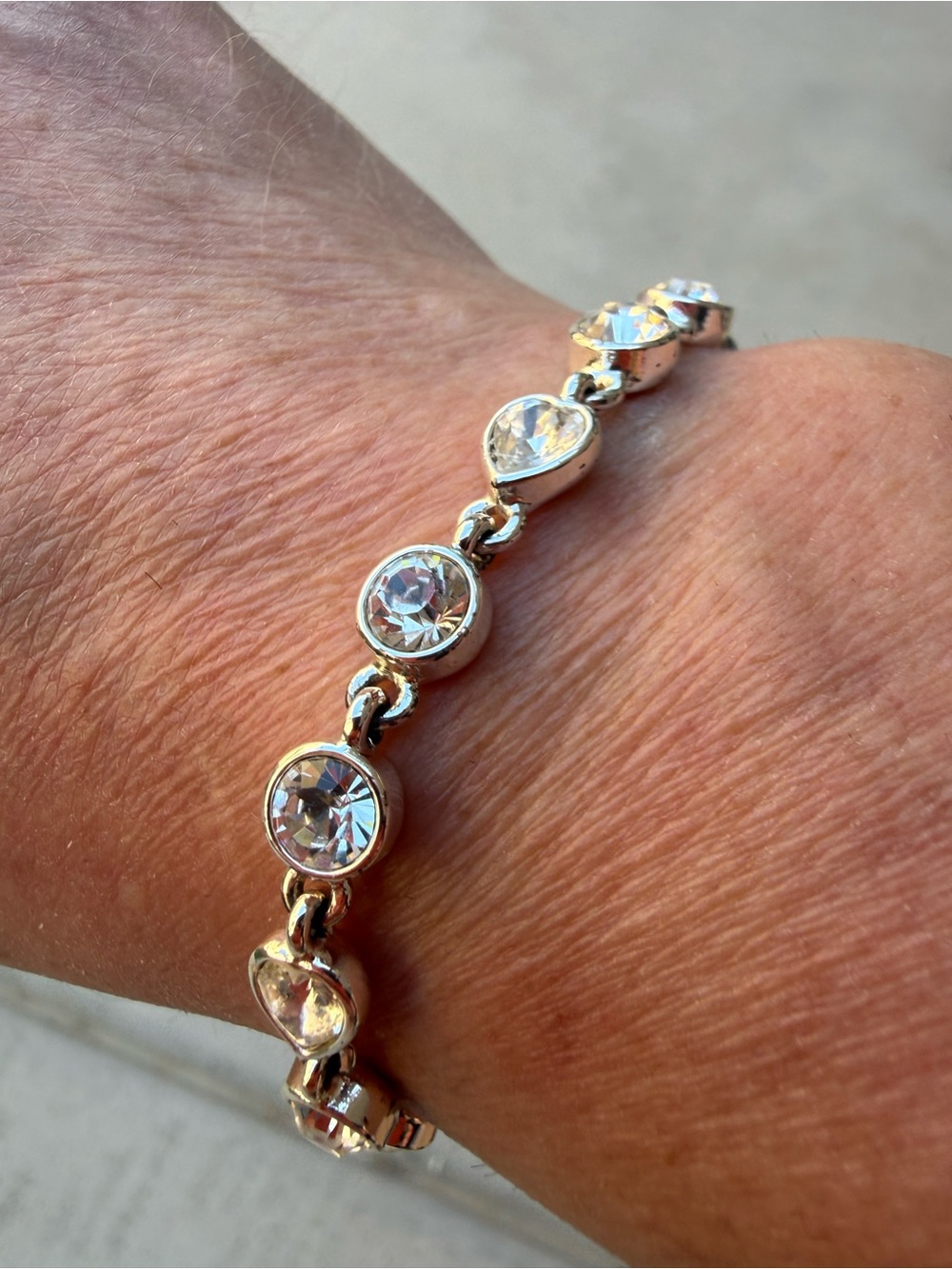 Signed Givenchy Silver-Tone Crystal Tennis Bracelet | Bezel-Set Round & Heart